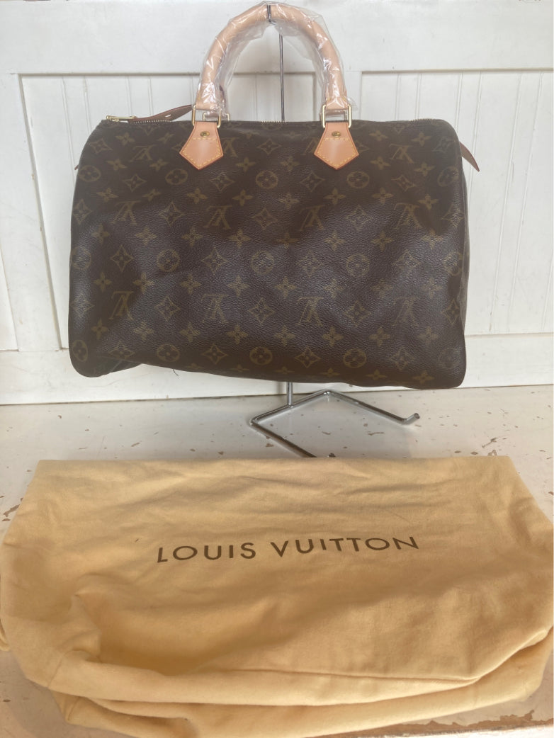 Louis Vuitton Brown Leather Monogram 