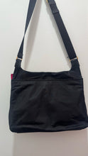 Load image into Gallery viewer, TUMI Black Nylon gold hardware Size Medium crossbody Purse
